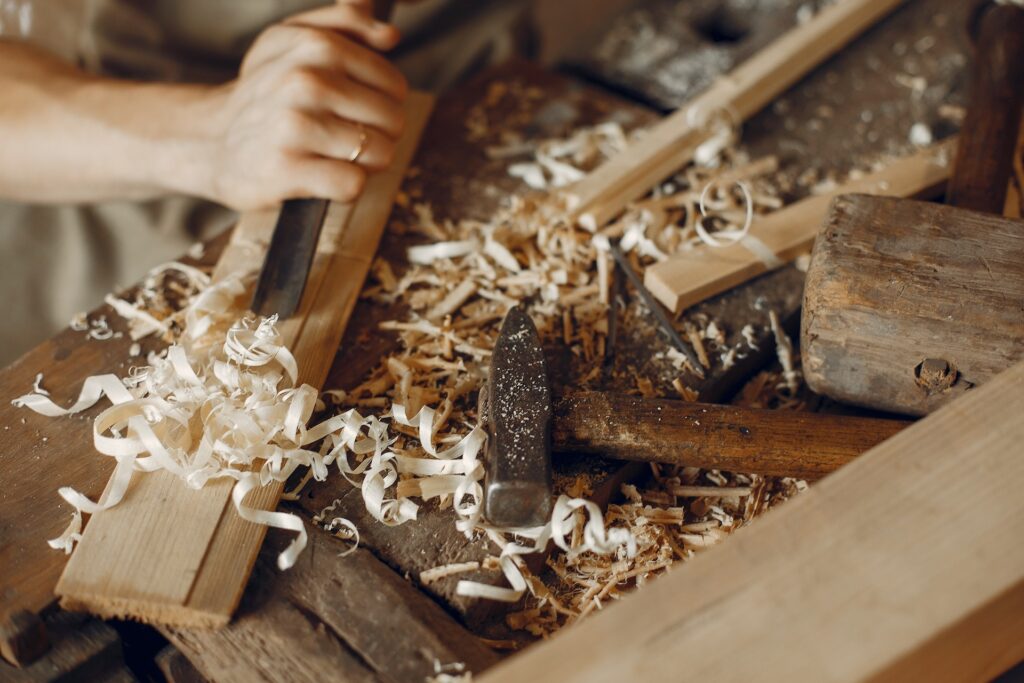 handsome carpenter working with a wood 2024 12 07 03 54 13 utc